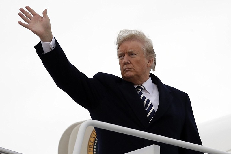 President Donald Trump waves as he boards Air Force One for a campaign rally in Columbia, Mo., Thursday, Nov. 1, 2018, in Andrews Air Force Base, Md. (AP Photo/Evan Vucci)

