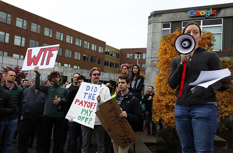 Alice Lemieux addresses fellow Google employees as they take part in a protest against what they said is the tech company's mishandling of sexual misconduct allegations against executives Thursday, Nov 1, 2018, in Seattle. (Alan Berner/The Seattle Times via AP)