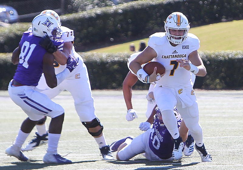 UTC junior quarterback Nick Tiano runs the ball during Saturday's SoCon game at Furman.