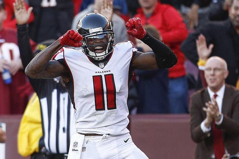 Atlanta Falcons wide receiver Julio Jones celebrates his touchdown catch during the second half of a game against the Washington Redskins on Nov. 4 in Landover, Md.

