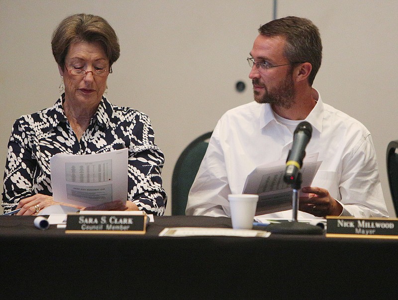 Staff photo by Erin O. Smith / Ringgold Councilwoman Sara Clark and Mayor Nick Millwood talk during a work session Monday, July 31, 2017, at the Catoosa County Colonnade in Ringgold, Ga. The Catoosa County Commission, Ringgold City Council and Fort Oglethorpe City Council held an Intergovernmental Work Session to discuss how to divide sales tax revenue, the state of the county jail and more.