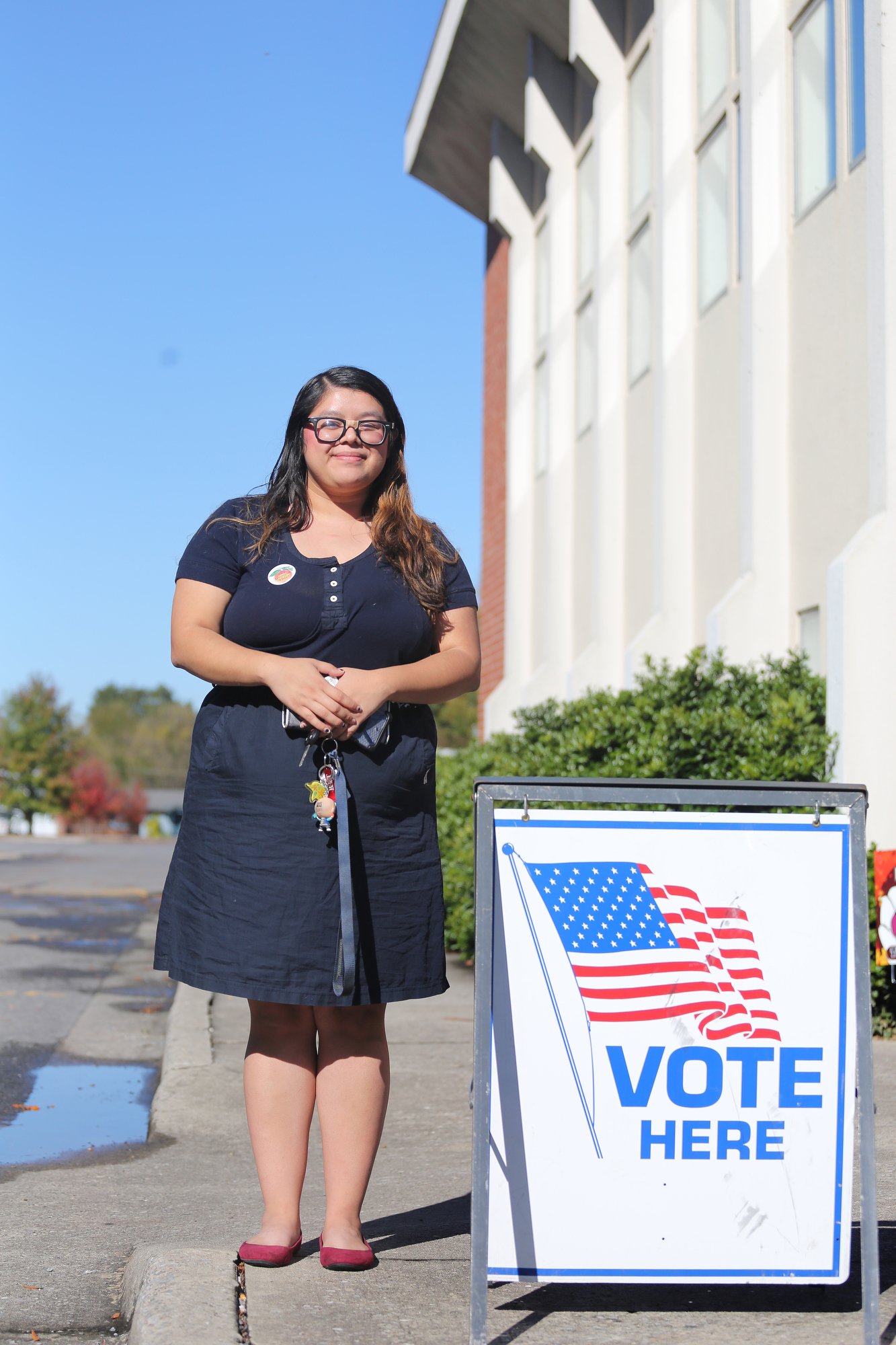 Marlen Hernandez poses for a photo Tuesday, November 6, 2018 outside the Dalton Recreation Center in Dalton, Georgia. Hernandez, who is originally from Mexico, got her citizenship in 2017 giving her the ability to vote. Hernandez took the day off work Tuesday, so she could vote for the first time.