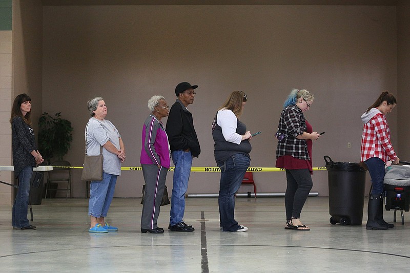 Voting hours extended at some polls; Kemp has trouble with