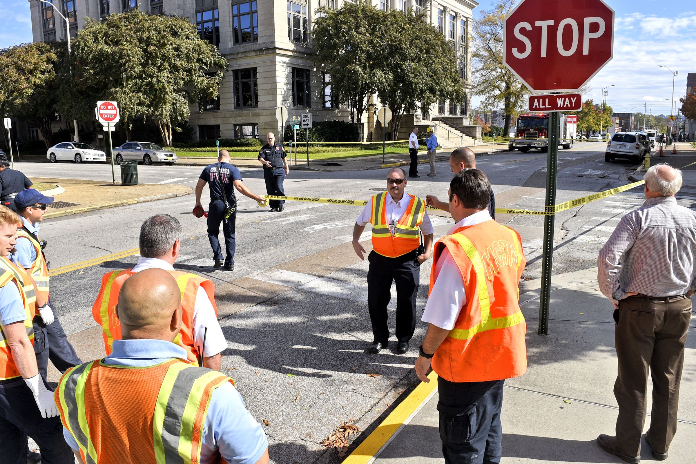 Emergency personal close East 11th Street at Lindsay Street because of a underground fire. A underground electrical fire lead to evacuations and road closers at the corner of East 11th Street and Lindsay Street by City Hall on November 6, 2018.