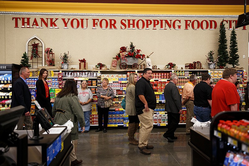 People tour Food City's new Mission Ridge Road location during its grand opening on Tuesday, Nov. 6, 2018, in Rossville, Ga. 