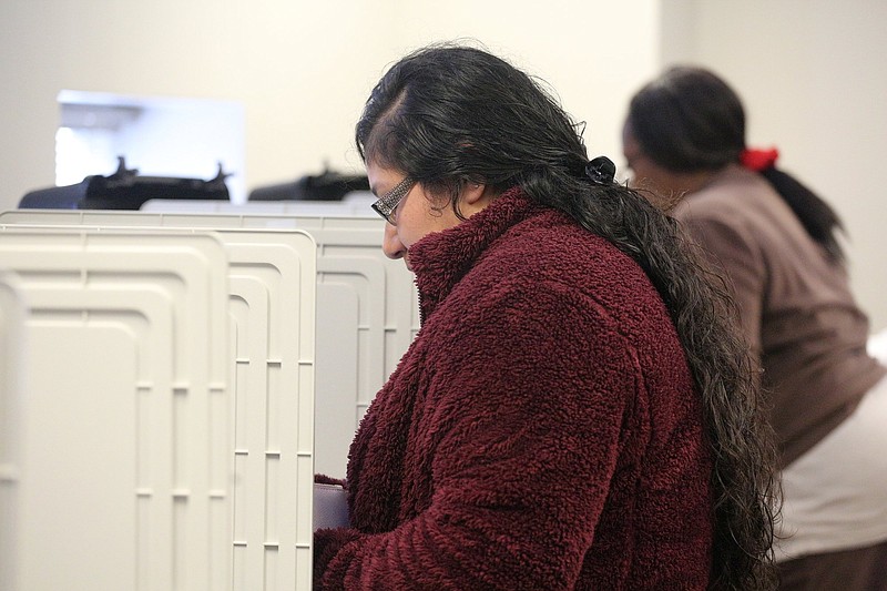 Daisy Canchola, 19, votes Tuesday, November 6, 2018 at the Mack Gaston Community Center in Dalton, Georgia. 