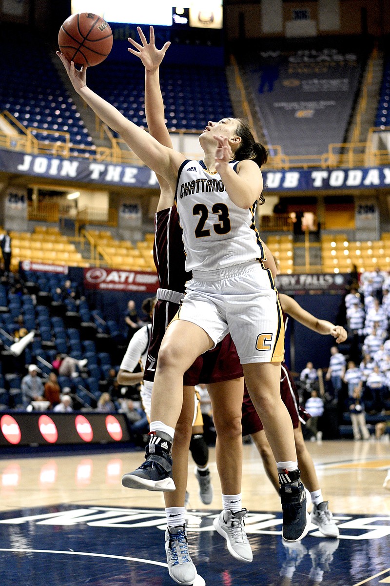 UTC's Brooke Burns (23) drives in for a layup.  The University of Tennessee at Chattanooga Mocs hosted the Lee Flames in women's basketball action on November 6, 2018.  