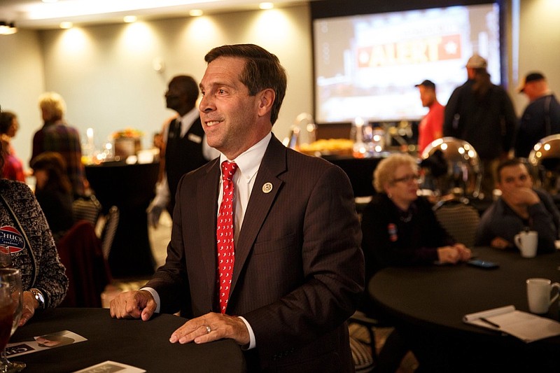 U.S. Rep. Chuck Fleischmann talks with supporters at a GOP election returns party at the Doubletree Hotel on Tuesday, Nov. 6, 2018, in Chattanooga, Tenn.