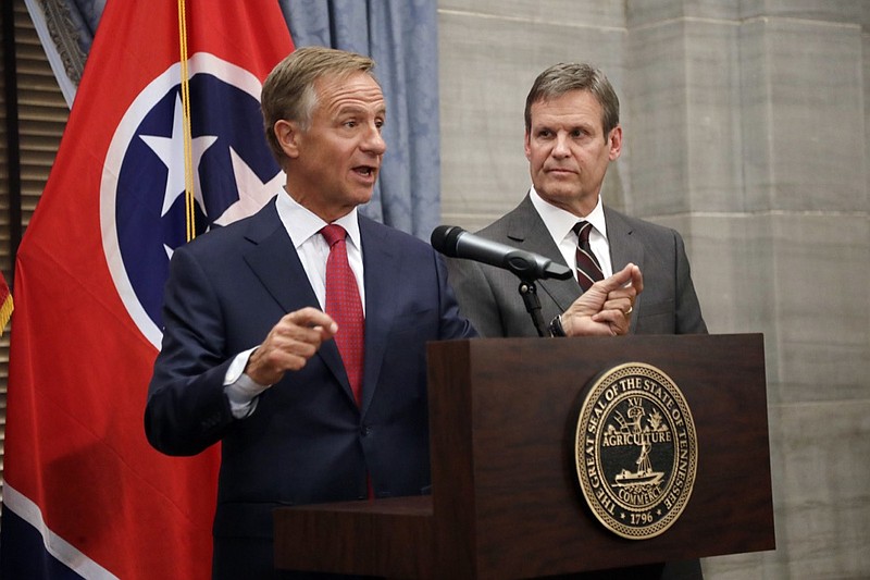 Gov. Bill Haslam, left, speaks during a news conference with Governor-elect Bill Lee, right, during a news conference in the Capitol Wednesday, Nov. 7, 2018, in Nashville, Tenn. Lee defeated Democrat Karl Dean in the gubernatorial race Tuesday. (AP Photo/Mark Humphrey)