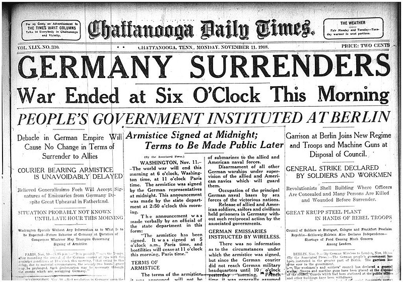 The top headlines in the Chattanooga Daily Times announced the surrender of Germany in 1918.
