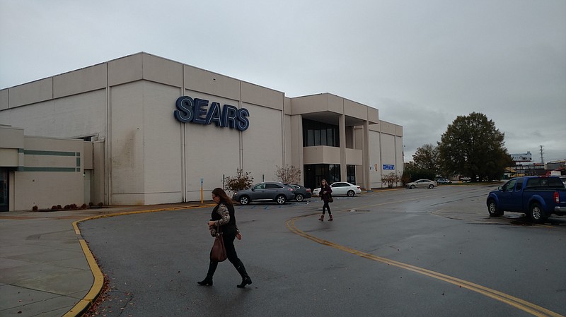 Staff photo by Mike Pare / Shoppers walk from the Northgate Mall parking lot to the center in front of the Sears store.