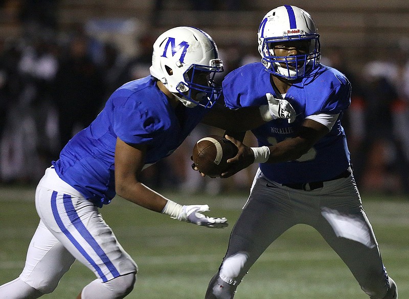 McCallie's Stone Roebuck (6) takes the handoff from quarterback DeAngelo Hardy (10) during the McCallie vs. Ensworth Division II-AAA football playoff game at McCallie School Friday, November 9, 2018 in Chattanooga, Tennessee.