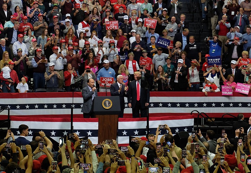 Lee Greenwood sings "Proud to Be An American," as Vice President Mike Pence and President Donald John Trump take in the scene of a capacity crowd at the outset of the MAGA Rally Sunday night at McKenzie Arena.