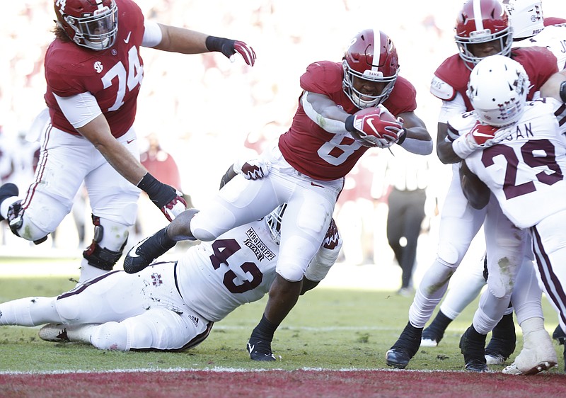 Alabama junior running back Josh Jacobs (8) had a 1-yard touchdown run and a 14-yard touchdown reception during the top-ranked Crimson Tide's 24-0 win over Mississippi State on Saturday in Tuscaloosa.