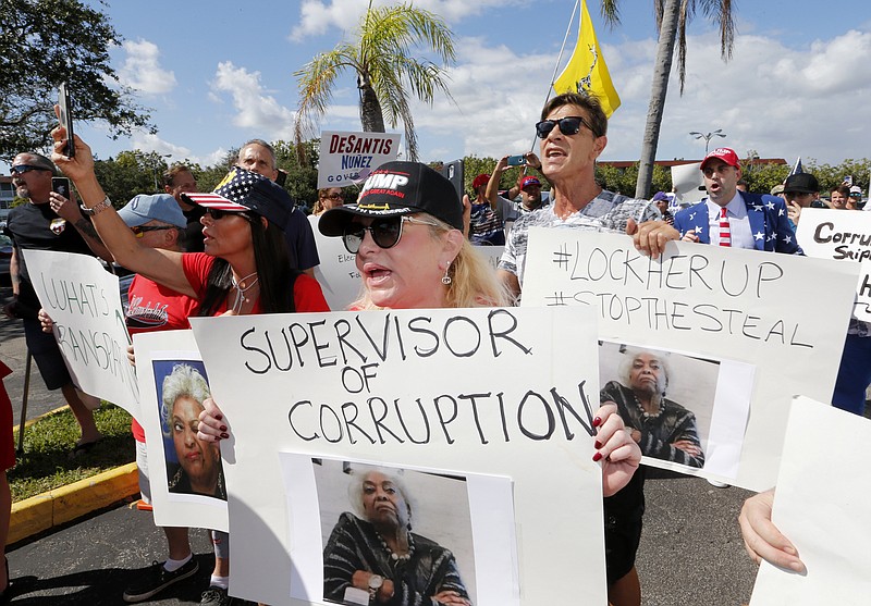 A crowd protests outside the Broward County Supervisor of Elections office in Florida last week as the state faces recounts in governor, Senate and agriculture commission races.