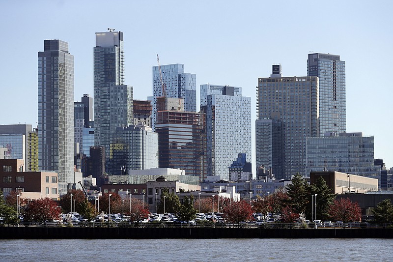 In this Wednesday, Nov. 7, 2018, photo, the Long Island City waterfront and skyline are shown in the Queens borough of New York. One of the areas that Amazon is considering for a headquarters is Long Island City. An old manufacturing area, it's cultivating a new image as a hub for 21st-century industry, creativity, and urbane living. (AP Photo/Mark Lennihan)