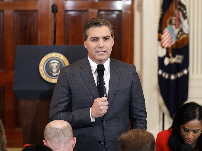 FILE - In this Nov. 7, 2018, file photo, CNN journalist Jim Acosta does a standup before a new conference with President Donald Trump in the East Room of the White House in Washington. CNN sued the Trump administration Tuesday, demanding that correspondent Jim Acosta's credentials to cover the White House be returned because it violates the constitutional right of freedom of the press. (AP Photo/Evan Vucci, File)

