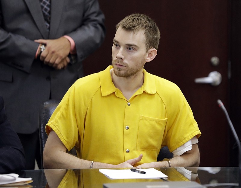 In this Aug. 22, 2018, file photo, Travis Reinking appears at a hearing in Nashville, Tenn. A judge says Reinking , charged with killing four people at a Tennessee Waffle House is liable in a $100 million wrongful death lawsuit filed by a victim's mother. A Davidson County Circuit Court judge last week found 29-year-old Travis Reinking civilly liable for the death of 23-year-old Akilah DaSilva. Reinking is accused of fatally shooting DaSilva and three others at the Nashville restaurant April 22. (AP Photo/Mark Humphrey)