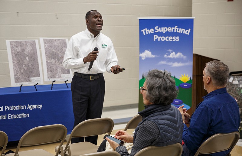 EPA site project manager Robenson Joseph answers a question during an EPA community meeting at South Chattanooga Recreation Center on Thursday, Nov. 15, 2018, in Chattanooga, Tenn. EPA officials briefed residents on the ongoing efforts to clean up lead contaminated sites across Chattanooga's south side.