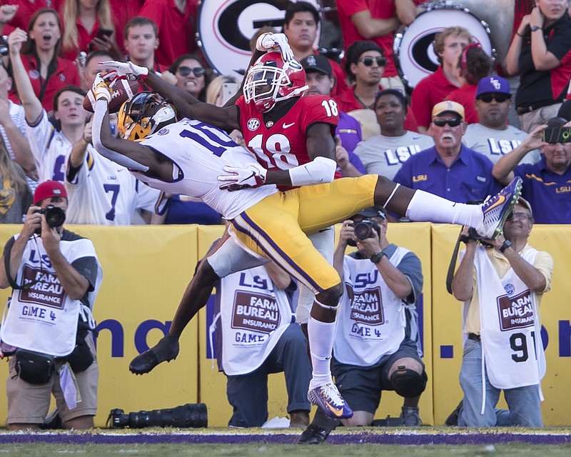 Georgia senior cornerback Deandre Baker breaks up a pass intended for LSU junior receiver Stephen Sullivan during last month's game in Baton Rouge, La.