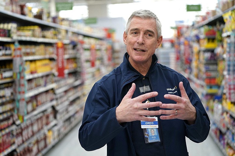 In this Friday, Nov. 9, 2018, photo Walmart U.S. President and CEO Greg Foran talks about the technology the company is using to keep shelves stocked at a Walmart Supercenter in Houston. Foran took over as CEO of the discounter’s U.S. division four years ago. (AP Photo/David J. Phillip)