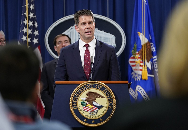 FBI Deputy Director David L. Bowdich speaks during a news conference to announce a criminal law enforcement action involving China, at the Department of Justice in Washington on Nov. 1, 2018. (AP Photo/Pablo Martinez Monsivais)