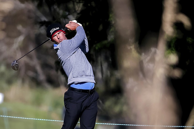 Charles Howell III tracks his shot on the ninth tee on the Seaside Course at Sea Island Resort during Friday's second round of the PGA Tour's RSM Classic on St. Simons Island, Ga.