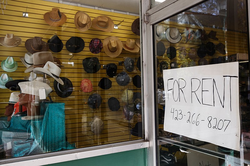 A "For rent" sign is seen in the window of the Downtown Mart shop on Market Street on Friday, Nov. 16, 2018, in Chattanooga, Tenn. 