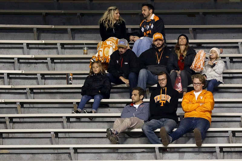 Staff photo by C.B. Schmelter / Tennessee football fans sit in the stands late in the Vols' SEC matchup with Missouri on Nov. 17, 2018, in Knoxville.