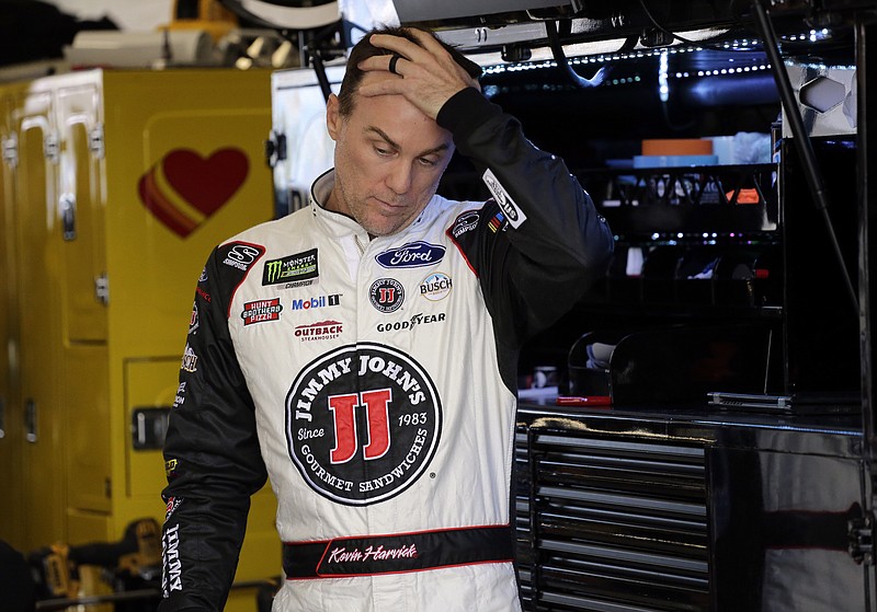 Kevin Harvick stands in the garage at Homestead-Miami Speedway on Friday during practice for today's NASCAR Cup Series season finale.