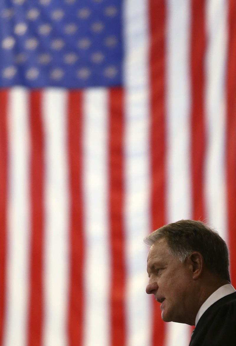 U.S. District Judge Harry S. Mattice Jr. speaks after the Oath of Allegiance during a naturalization ceremony at Red Bank High School on Tuesday, Sept. 19.