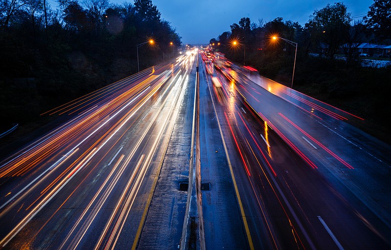 Traffic travels on Interstate 75 during a rainy commute on Wednesday, Nov. 14, 2018, in Chattanooga, Tenn. More than 54 million Americans are expected to travel this Thanksgiving, a 4.8 increase from 2017, according to AAA.