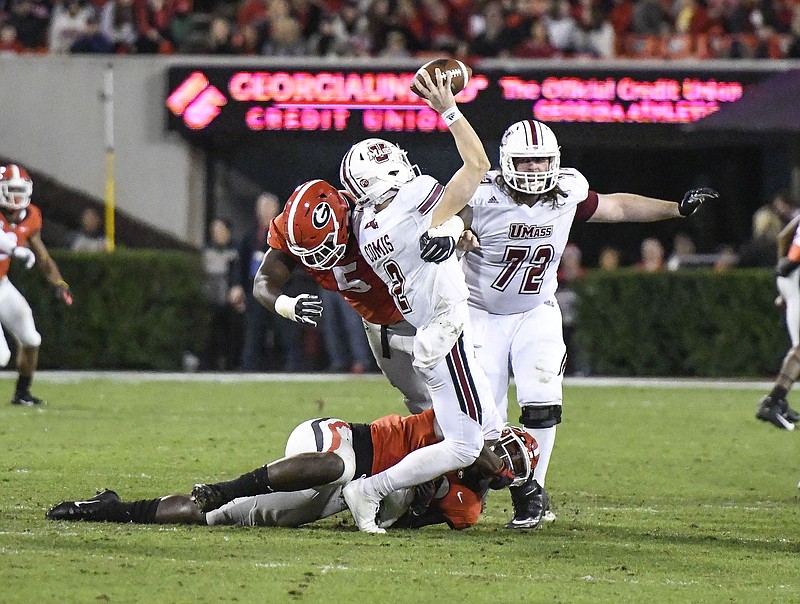 Georgia defensive lineman Julian Rochester (5) and his fellow Bulldogs on that side of the ball must transition from Saturday's win over pass-happy UMass to Georgia Tech's ground-based triple-option attack.