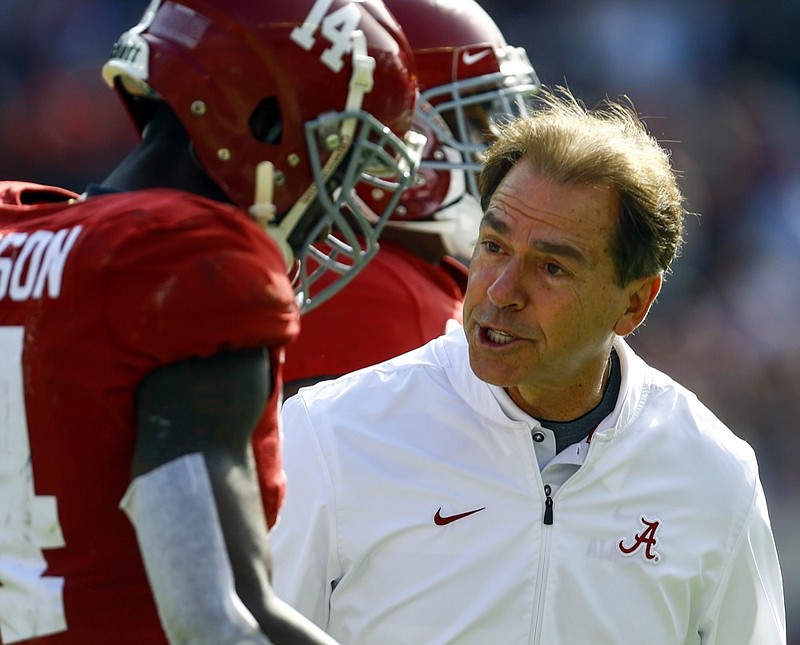 Alabama head coach Nick Saban talks with Alabama defensive back Deionte Thompson (14) after a play during the first half of an NCAA college football game, Saturday, Nov. 17, 2018, in Tuscaloosa, Ala. (AP Photo/Butch Dill)

