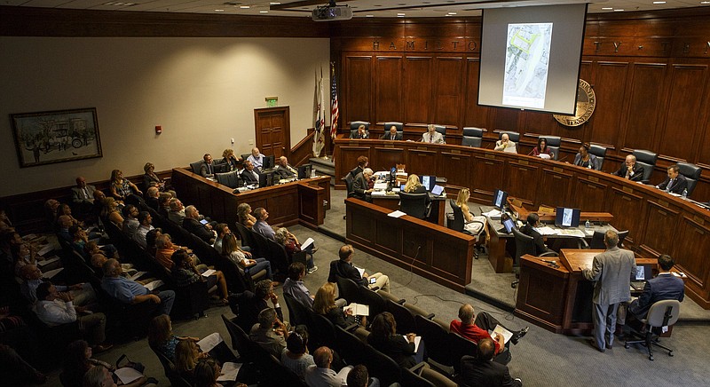 Hamilton County Water and Wastewater Treatment Authority Executive Director Mark Harrison, standing at the lectern, appears before the Hamilton County Commission during a meeting to answer questions at the Hamilton County Courthouse on Oct. 3, 2018.