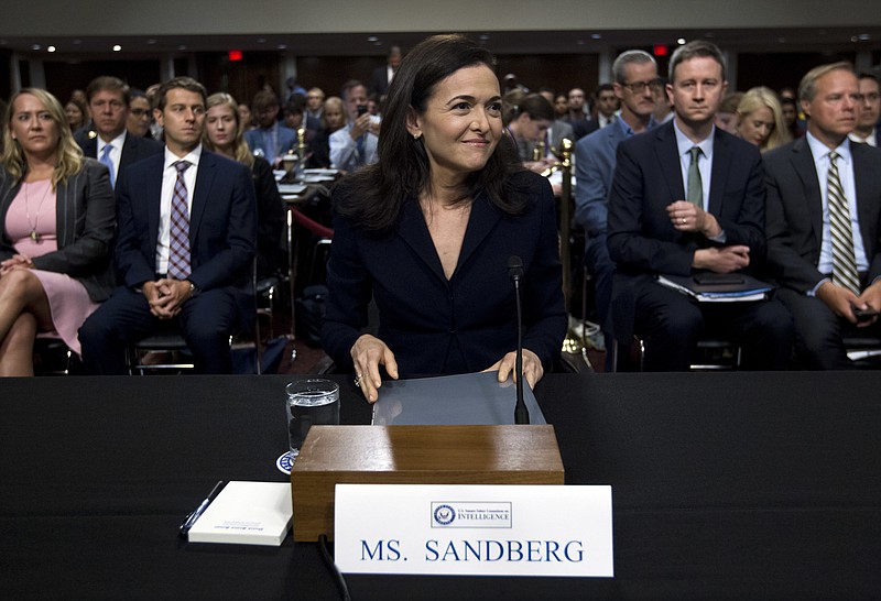 FILE- In this Sept. 5, 2018, file photo Facebook COO Sheryl Sandberg testifies before the Senate Intelligence Committee hearing on 'Foreign Influence Operations and Their Use of Social Media Platforms' on Capitol Hill in Washington. For the past decade, Sandberg has been the poised, reliable second-in-command to Facebook CEO Mark Zuckerberg, helping steer Facebook’s rapid growth around the world, while also cultivating her brand in ways that hint at aspirations well beyond the social network. (AP Photo/Jose Luis Magana, File)