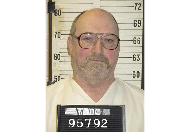 FILE - This undated file photo provided by the Tennessee Department of Correction shows inmate David Earl Miller in Nashville, Tenn. Tennessee death row inmate Miller faces a Tuesday afternoon, Nov. 20, 2018, deadline to inform prison officials whether he wants to be executed by lethal injection or electrocution. Miller is scheduled to die on Dec. 6 for the 1981 murder of 23-year-old Lee Standifer in Knoxville. (Tennessee Department of Correction via AP, File)

