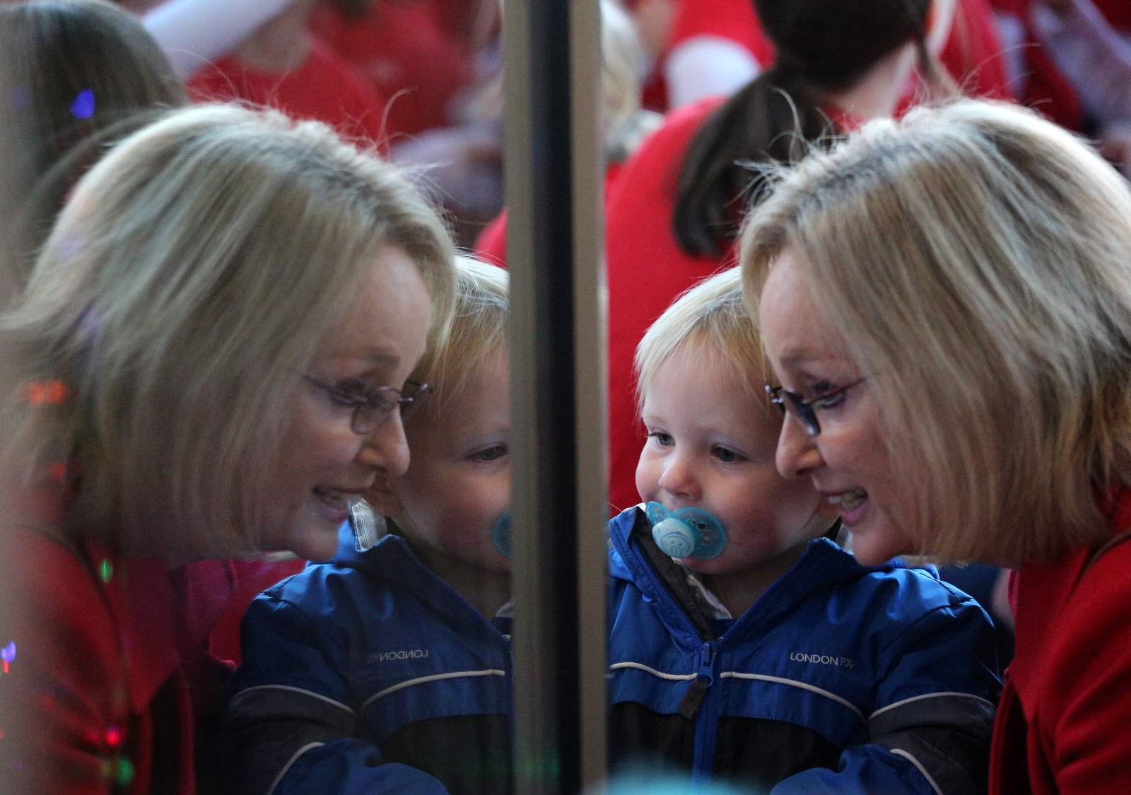 Luke Wright, 2, looks at the EPB Holiday Window display with his grandmother Billie Wright during EPB's traditional window revealing Wednesday, November 21, 2018 in Chattanooga, Tennessee. Each year, EPB reveals their Holiday Windows on Thanksgiving Eve.