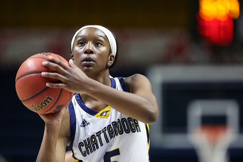 UTC's Eboni Williams takes a free throw during Wednesday night's game against Liberty at McKenzie Arena.