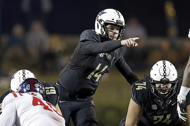 Vanderbilt quarterback Kyle Shurmur points out the coverage of the Ole Miss defense to the rest of the offense during last Saturday's game in Nashville. Vanderbilt won in overtime to set up a battle for bowl eligibility against Tennessee this weekend in the regular-season finale for both.