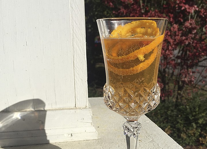 London Calling's Cinnamon Earl Grey Fizz mixes vodka, Earl Grey tea, cinnamon syrup and Champagne with an orange zest spiral.
