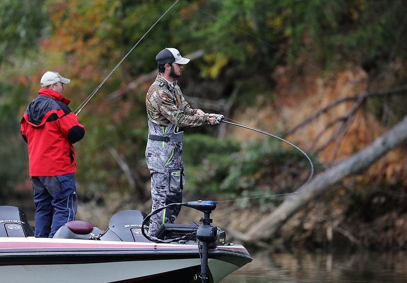 Jason Risley and Logan Millsaps fish from their boat during Fishing League Worldwide Bass Fishing League Regional Championship tournament Thursday, October 25, 2018 held on Lake Chickamauga in Dayton, Tennessee. More than 200 anglers took part in the tournament.