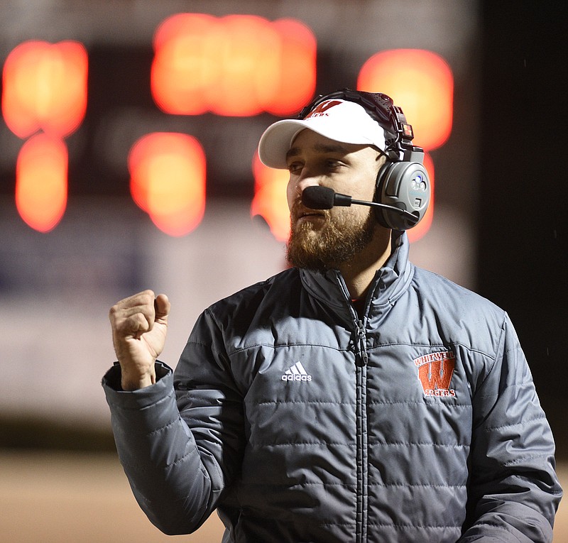Whitwell football coach Randall Boldin pumps his fist at his Tigers score a two-point conversion to tie their TSSAA Class 1A state semifinal against the Greenback Cherokees last November.