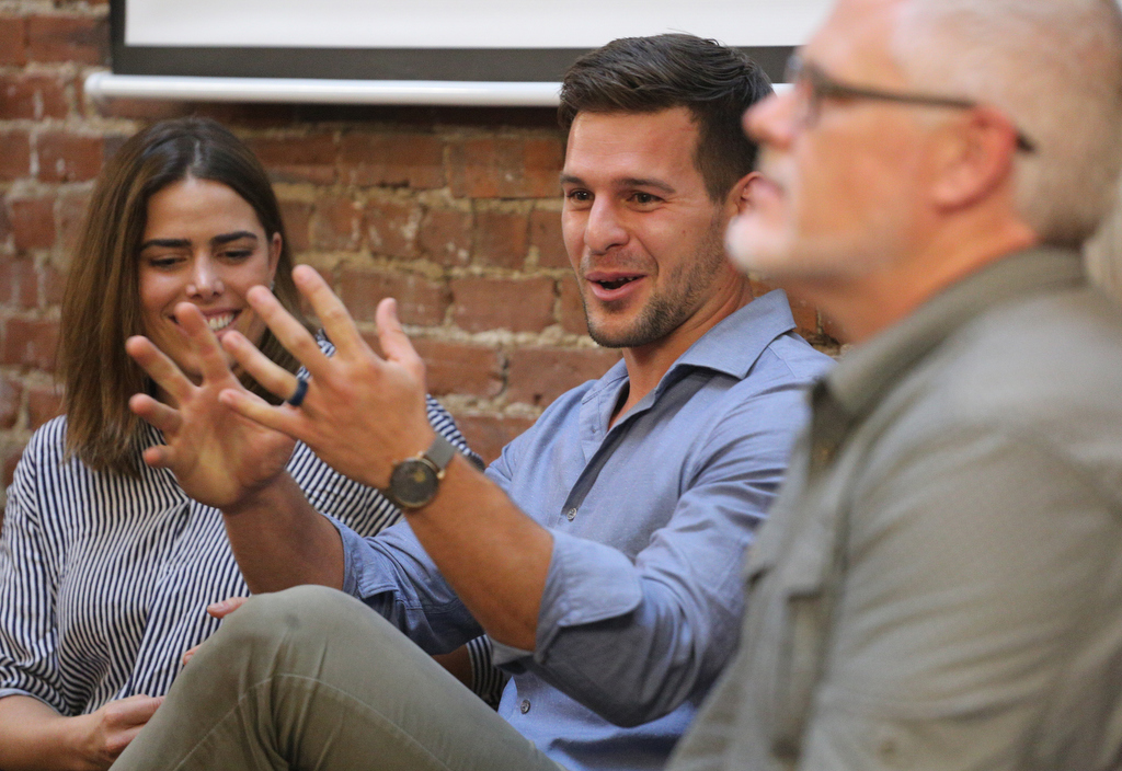 Marco Biscarini talks about lessons learned from owning a business with his wife Romana Biscarini, who is seated to his left during the Startups with your Spouse session in the Tomorrow Building during Startup Week Monday, October 22, 2018 in Chattanooga, Tennessee. Marco said that owning a business together helped them learn even more about each other's strengths and weaknesses.