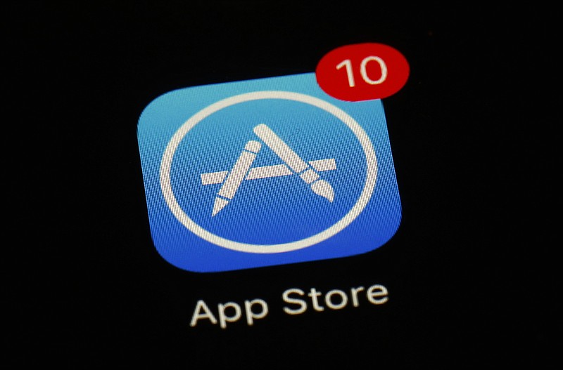 This March 19, 2018, file photo shows Apple's App Store app in Baltimore. Apple is at the Supreme Court to defend the way it sells apps for iPhones against claims by consumers that the company has unfairly monopolized the market. The justices heard arguments Monday in Apple's effort to end an antitrust lawsuit that could force the iPhone maker to cut the 30 percent commission it charges software developers whose apps are sold exclusively through Apple's App Store. (AP Photo/Patrick Semansky, File)