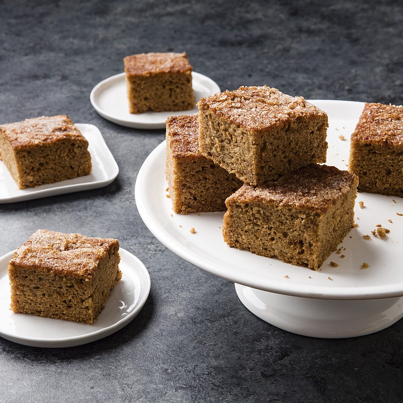This undated photo provided by America's Test Kitchen in October 2018 shows applesauce snack cake in Brookline, Mass. This recipe appears in the cookbook "Perfect Cake." (Joe Keller/America's Test Kitchen via AP)