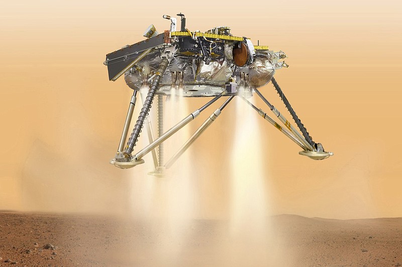This illustration made available by NASA in October 2016 shows an illustration of NASA's InSight lander about to land on the surface of Mars. NASA's InSight spacecraft will enter the Martian atmosphere at supersonic speed, then hit the brakes to get to a soft, safe landing on the alien red plains. After micromanaging every step of the way, flight controllers will be powerless over what happens at the end of the road, nearly 100 million miles away. (NASA/JPL-Caltech via AP)