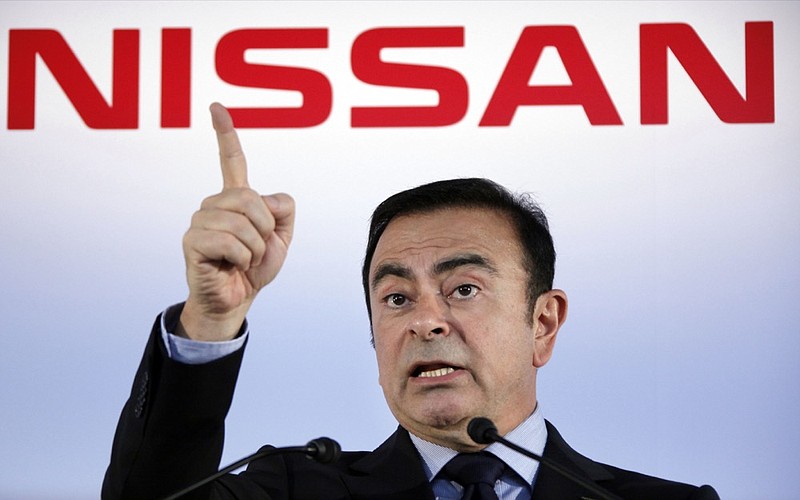 FILE - In this May 11, 2012, file photo, President and Chief Executive Officer of Nissan Motor Co., Carlos Ghosn speaks during a press conference in Yokohama, near Tokyo. A trailblazer and visionary in the auto industry, Ghosn is also a highflyer prone to excesses that may have helped bring on his surprise downfall as head of the world's best-selling auto group. Ghosn was arrested last week in Japan for allegedly falsifying financial reports and misusing funds at Nissan Motor Co. It was a stunning reversal for the industry icon. (AP Photo/Koji Sasahara, File)

