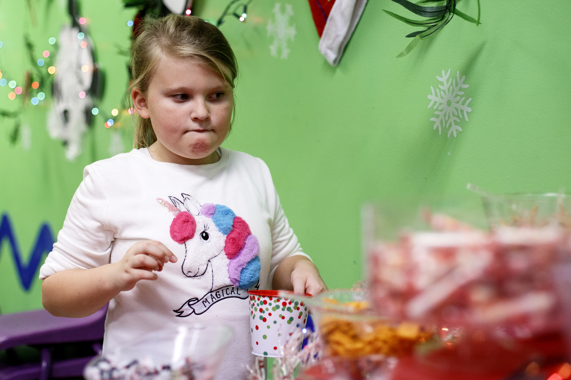 Aubrey Fink, 8, picks out candy supplies to build her gingerbread house with during the Gingerbread Workshop at the Creative Discovery Museum on Sunday, Nov. 25, 2018 in Chattanooga, Tenn.