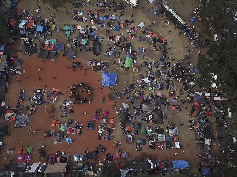 Central American migrants heading for the United States gather in an area designated for them to set up their tents in Tijuana, Mexico, last week.